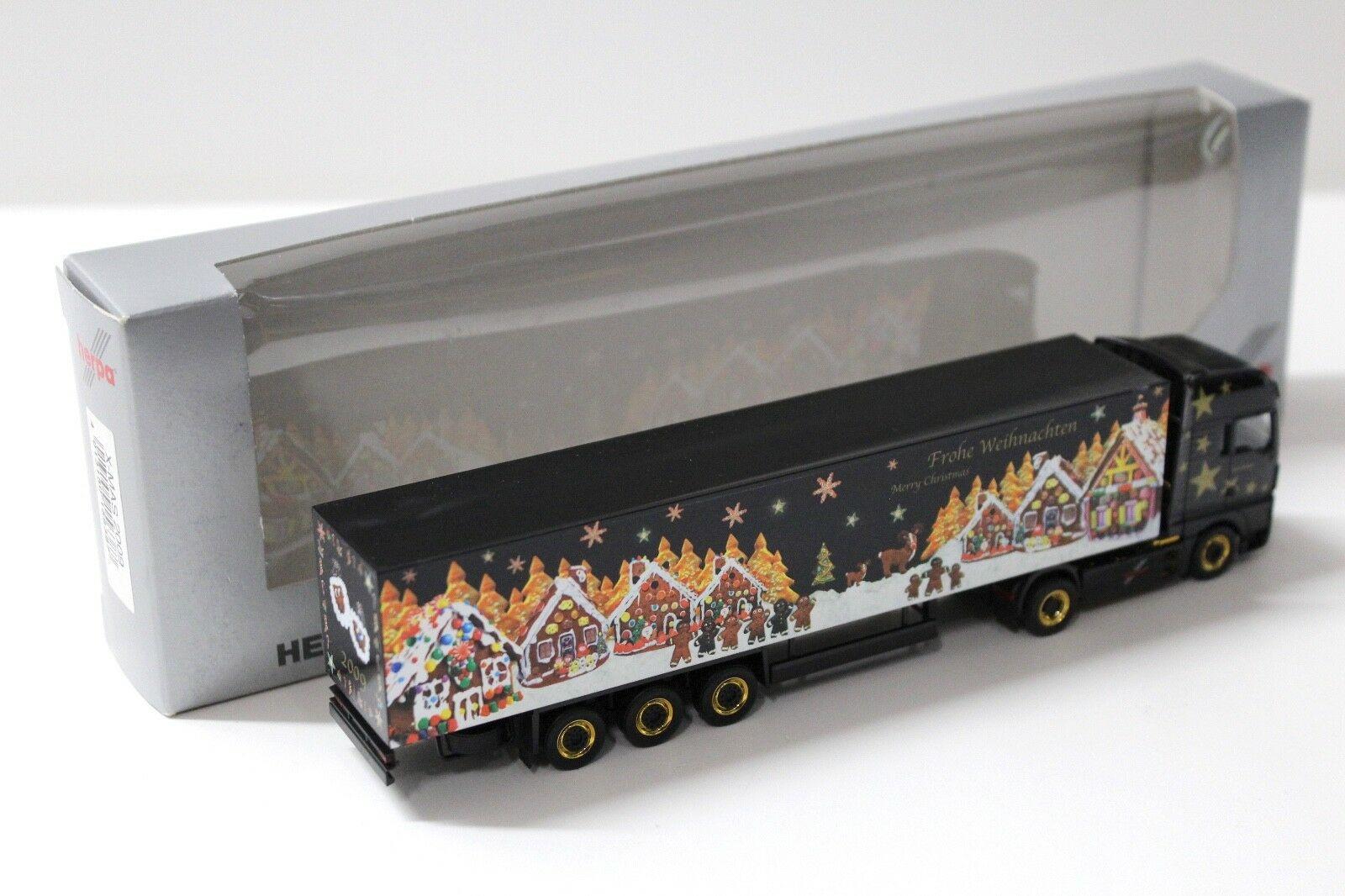 1:87 Herpa MAN TGX XXL Koffer-SZ "Weihnachten 2009" 