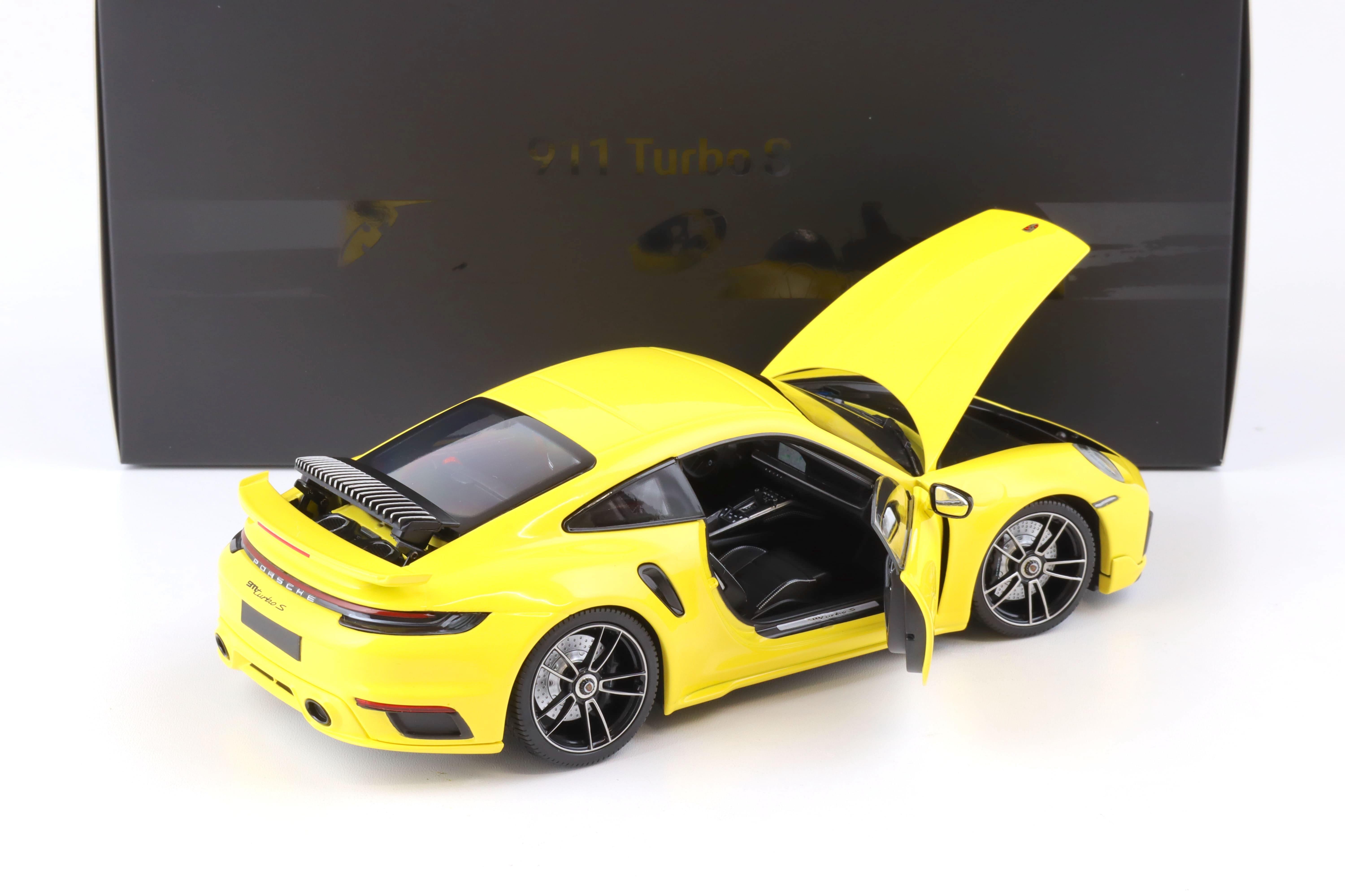 1:18 Minichamps Porsche 911 (992) Turbo S Coupe Sport Design 2021 yellow